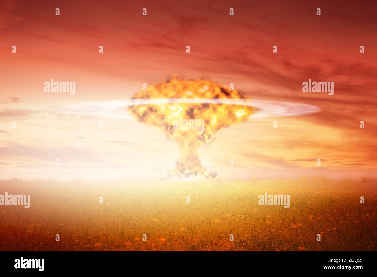 Nuclear explosion in the field. Nuclear threat and world war theme image Stock Photo
