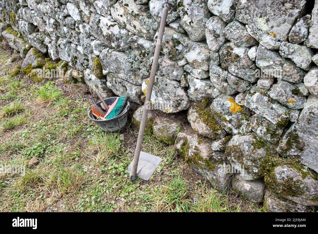 tools leaning against a wall in an archaeological excavation Archaeology works Stock Photo
