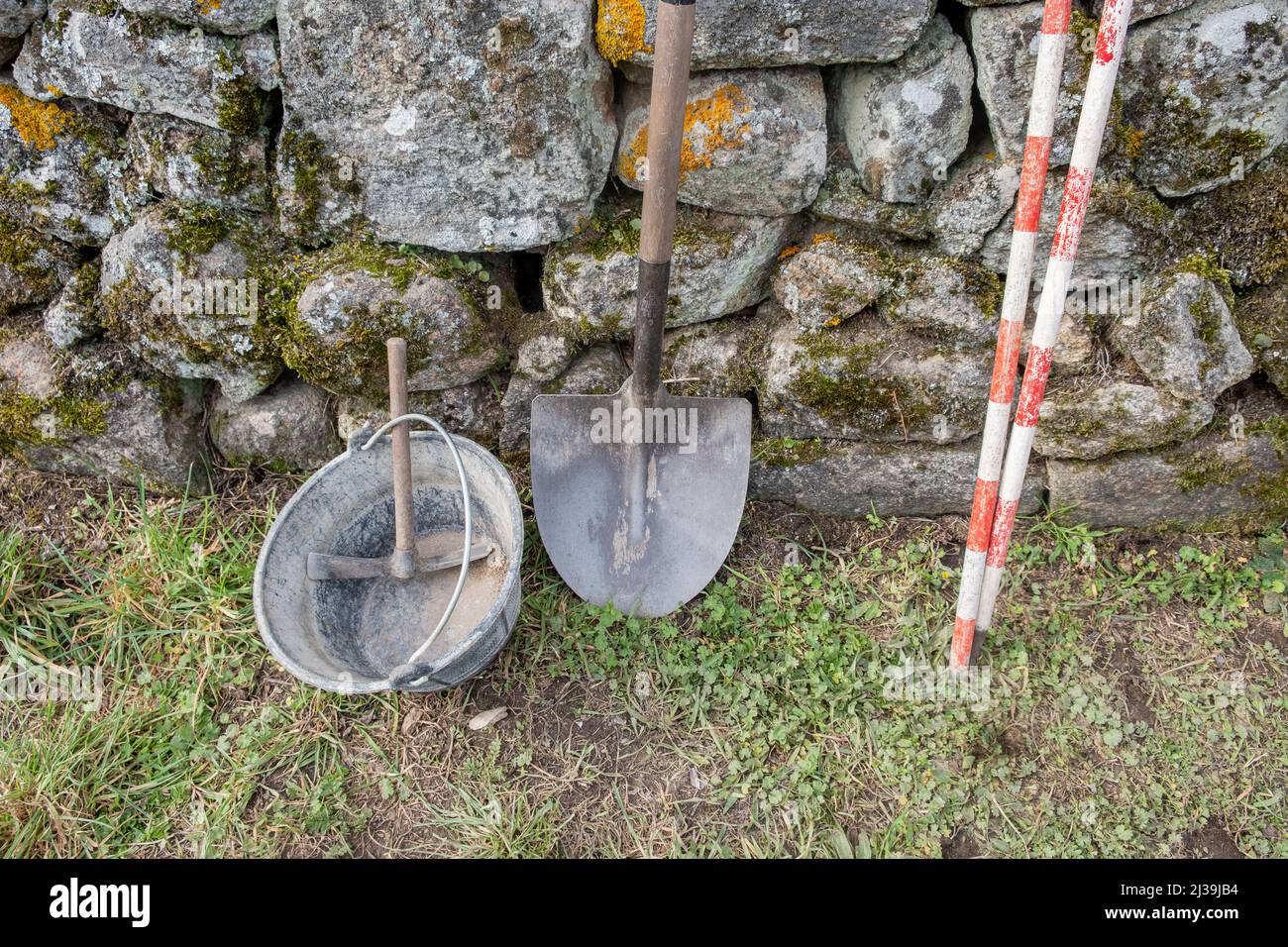 tools leaning against a wall in an archaeological excavation Archaeology works Stock Photo