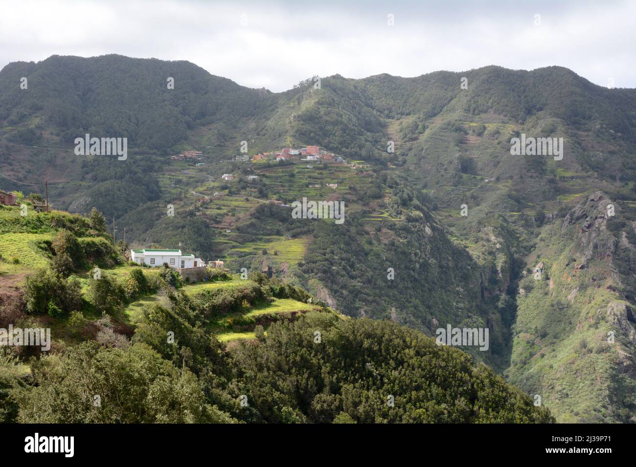 The Spanish village of Las Carboneras in the Anaga Mountains of Tenerife, seen from the town of Taborno, Anaga Rural Park, Canary Islands, Spain. Stock Photo