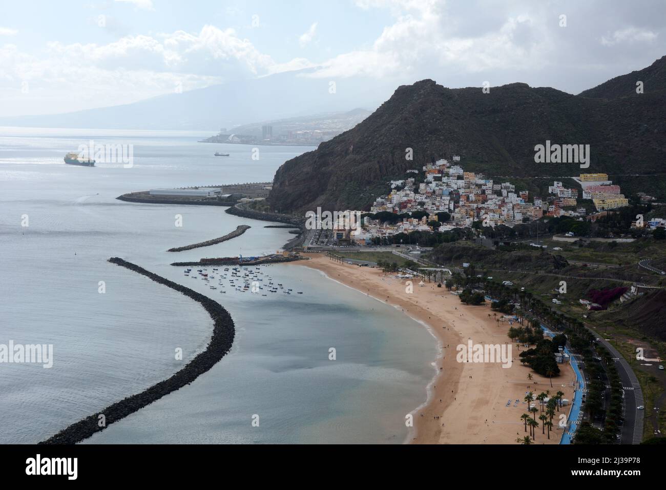 The Playa de Las Teresitas, an artificial beach and its breakwater, San Andres, Anaga Mountains, Santa Cruz de Tenerife, Canary Islands, Spain. Stock Photo