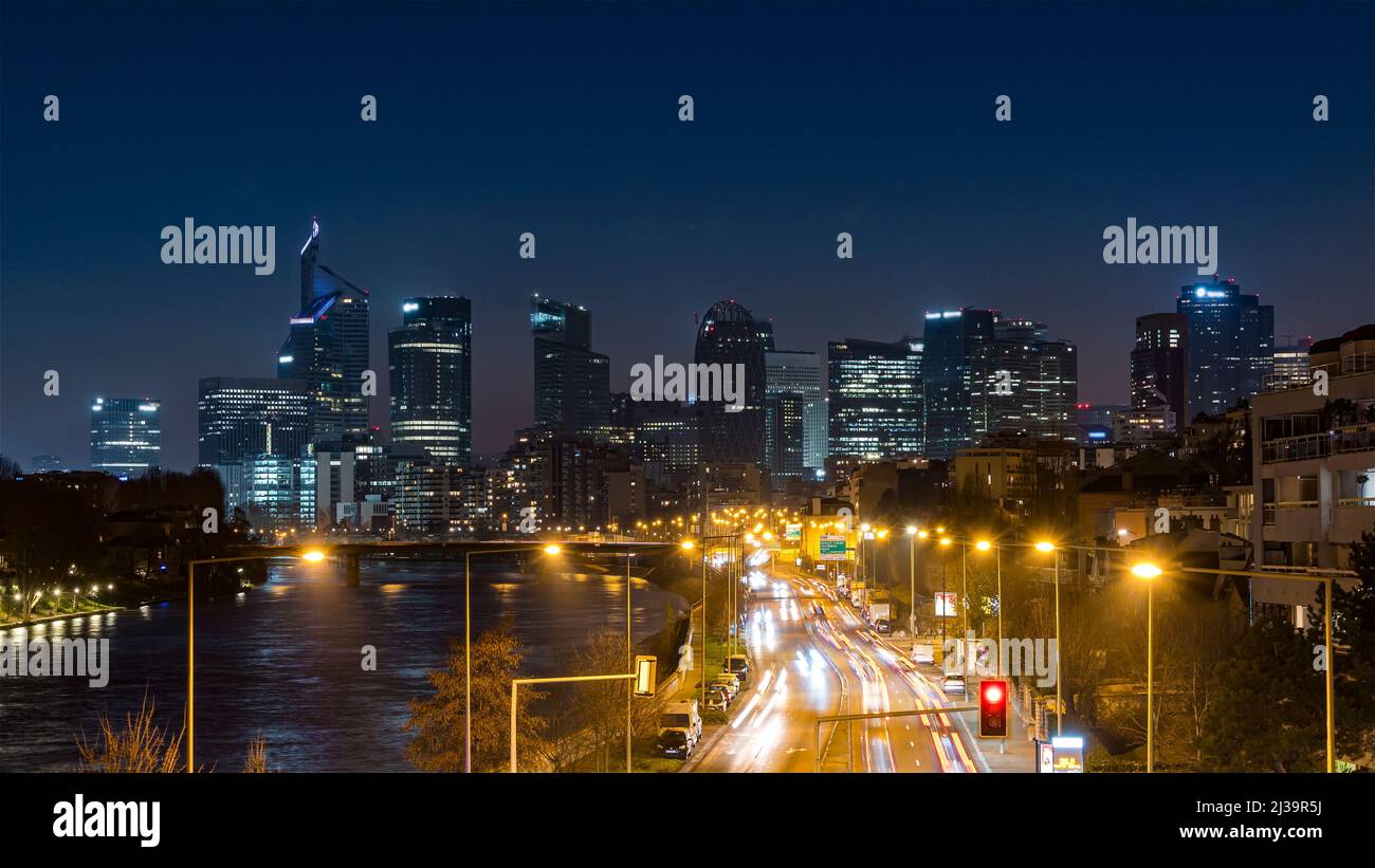 Skyline of La Defense Business District at Night With Traffic Stock Photo