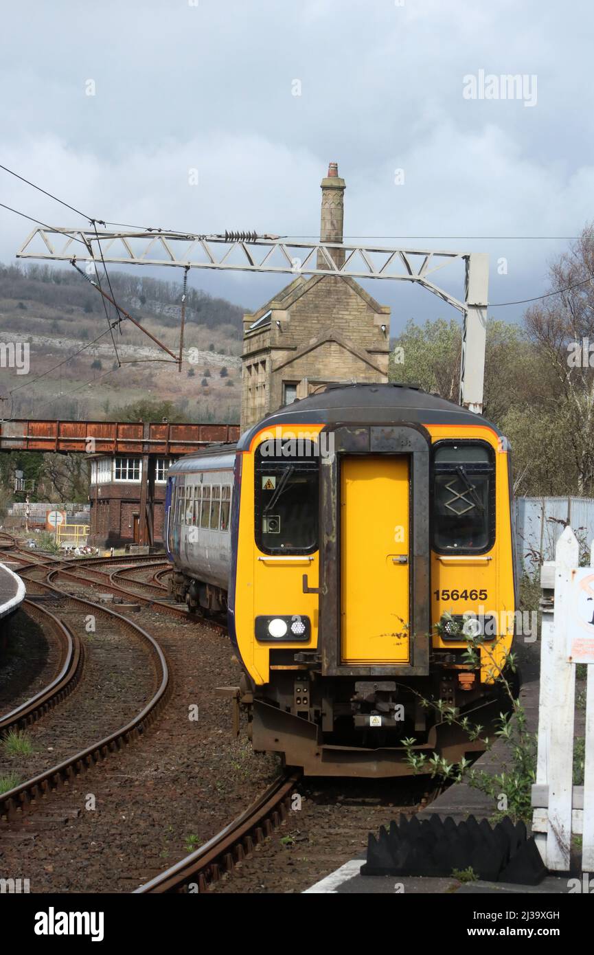 Northern Trains class 156 super sprinter dmu, unit number 156465, entering platform 1 at Carnforth railway station on Wednesday 6th April 2022. Stock Photo