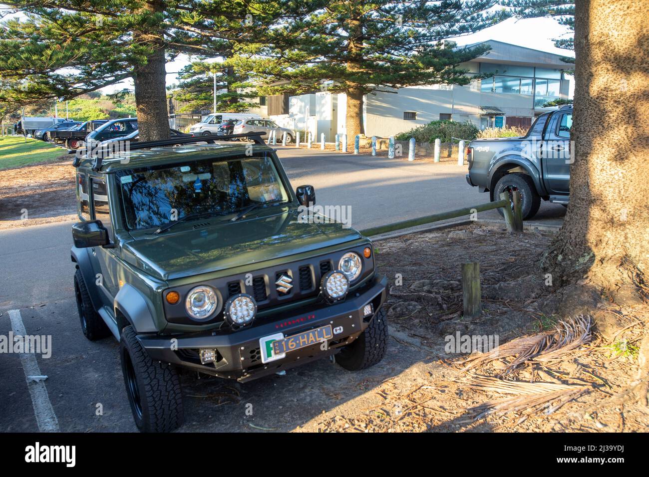 Suzuki Jimny 2021 model in green parked at a Sydney beach,NSW,Australia Stock Photo