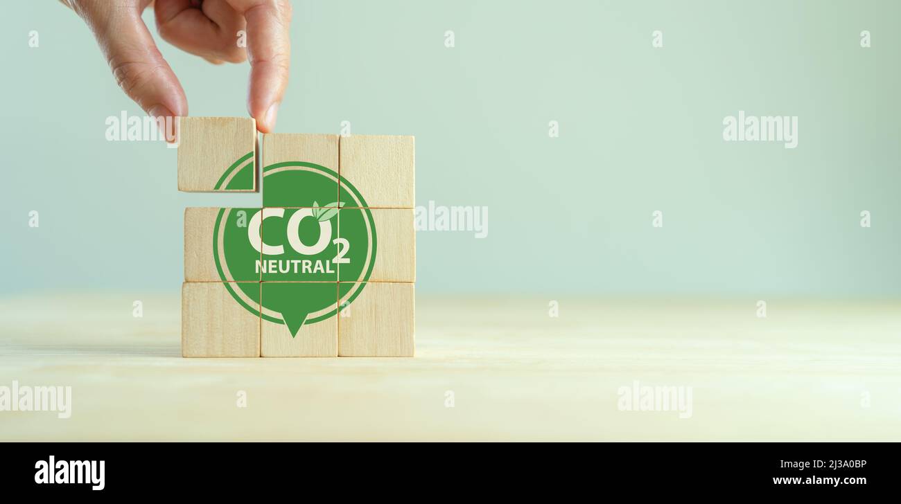 Carbon neutral sustainable development concept. Green industry. Net zero greenhouse gas emissions target 2050. Climate neutral long term strategy. Woo Stock Photo