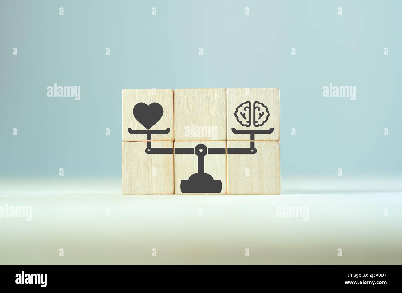 Balancing hard and soft skills concept. Training of skills Human resource management(HRM). wooden cubes with hard and soft skills on scales icon for c Stock Photo