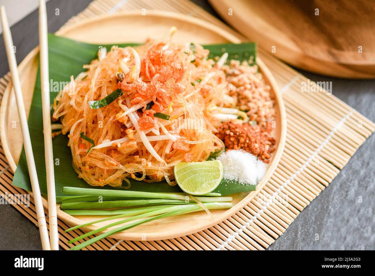 Thai food fried noodle Thai style with prawns bean sprout and garnish