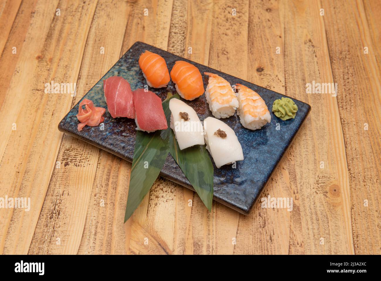 Assorted nigiri sushi tray with bluefin tuna, Norwegian salmon, white