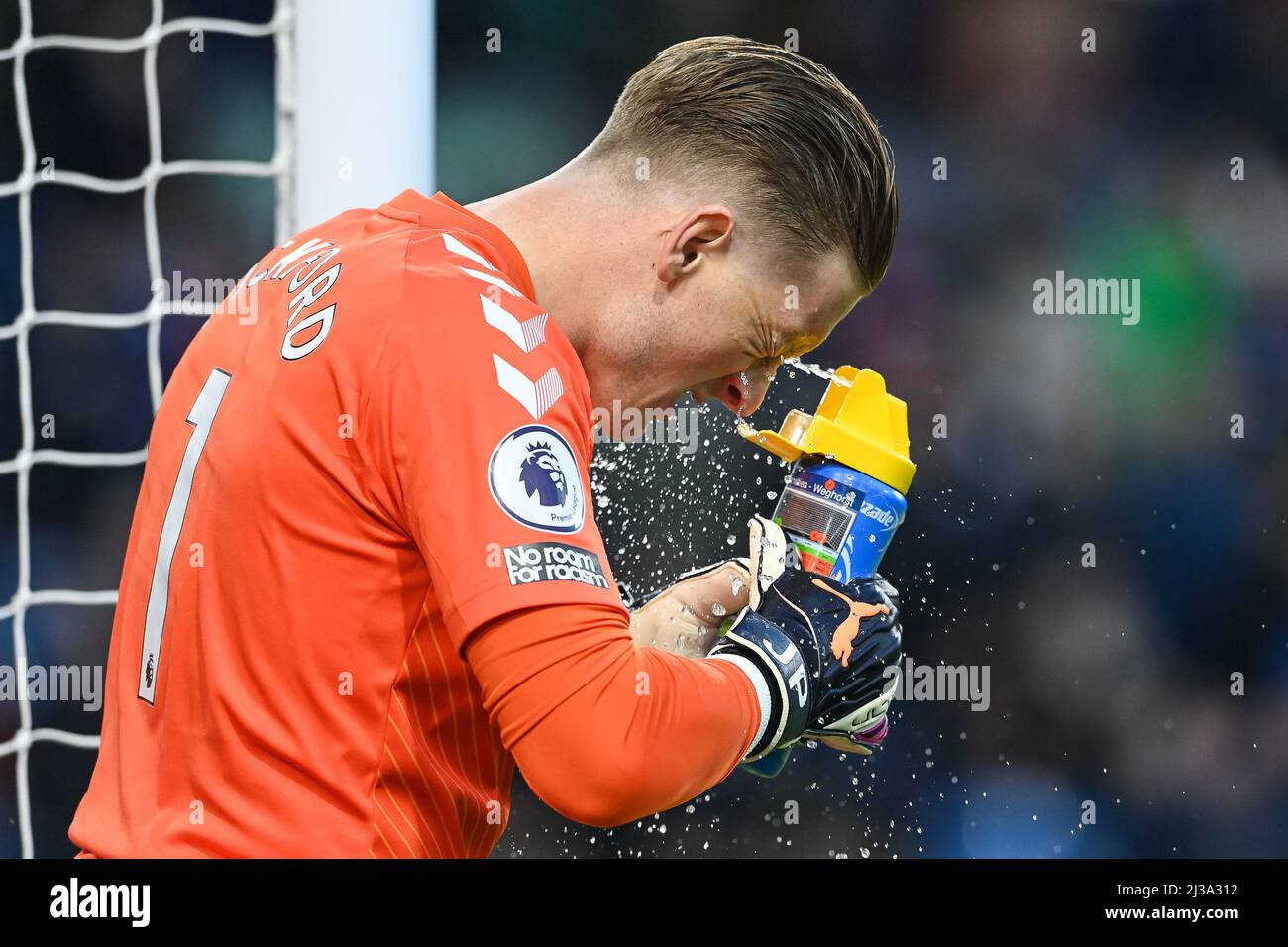 Jordan Pickford #1 of Everton squirts water into his face before the game Stock Photo