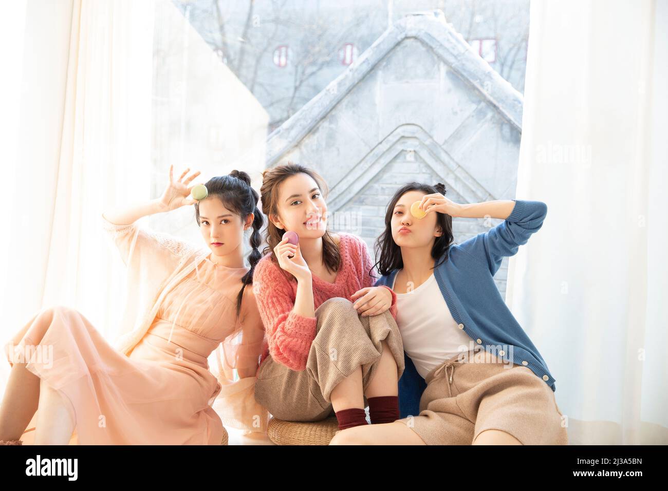 The leisure time of beautiful young fashionable ladies in China - stock photo Stock Photo