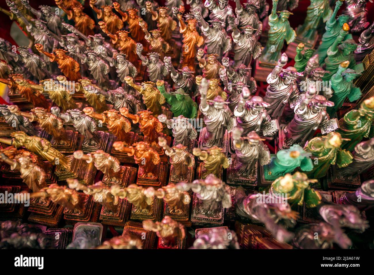 Statues of Liberty souvenirs stored in a souvenir store in Chinatown in New York Stock Photo