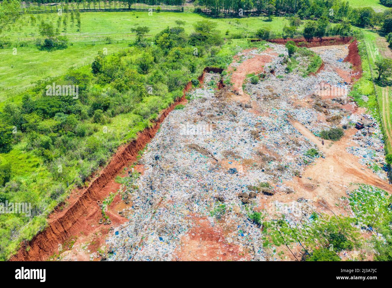 Aerial view of a garbage dump, landfill in Colonia Independencia in Paraguay. Stock Photo