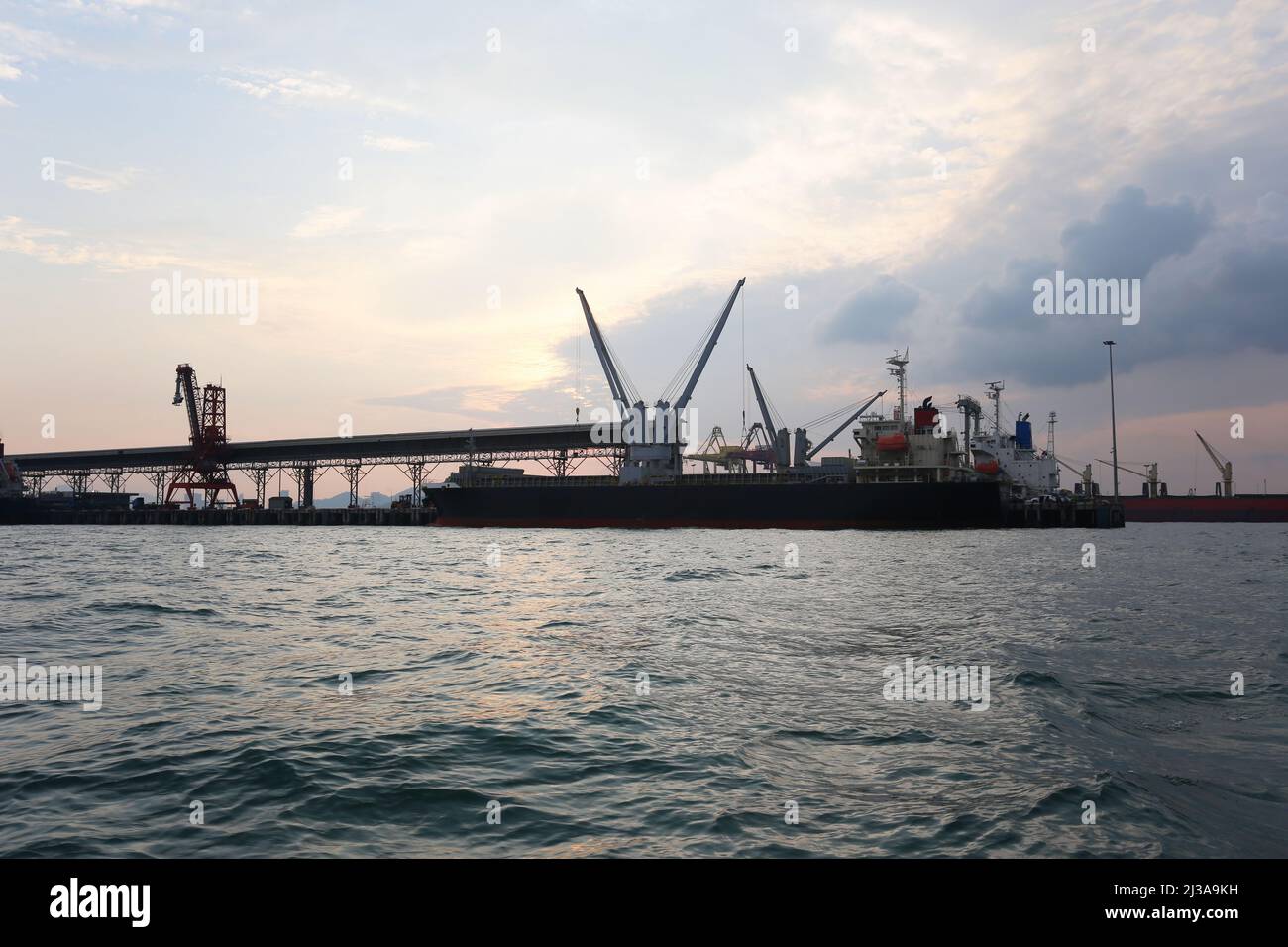 Deep sea port in the morning on a day when the sky is bright. Stock Photo