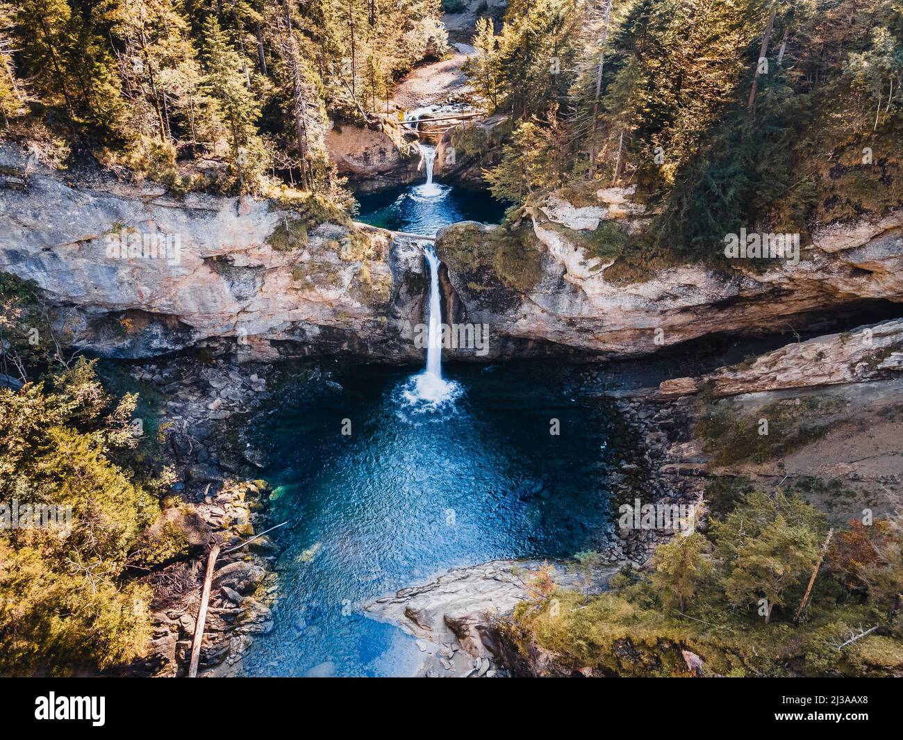 An aerial view of Buchenegger Wasserfalle, Buchenegger Waterfall on a sunny day in Oberstaufen, Germany Stock Photo
