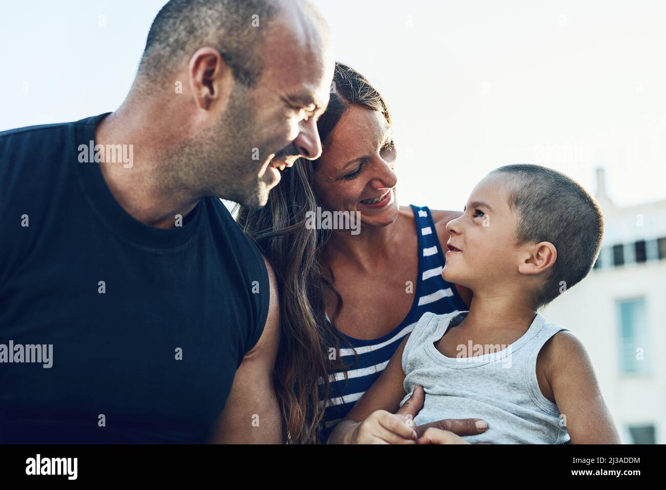 Family means everything to them. Cropped shot of a family of three spending the day outdoors. Stock Photo