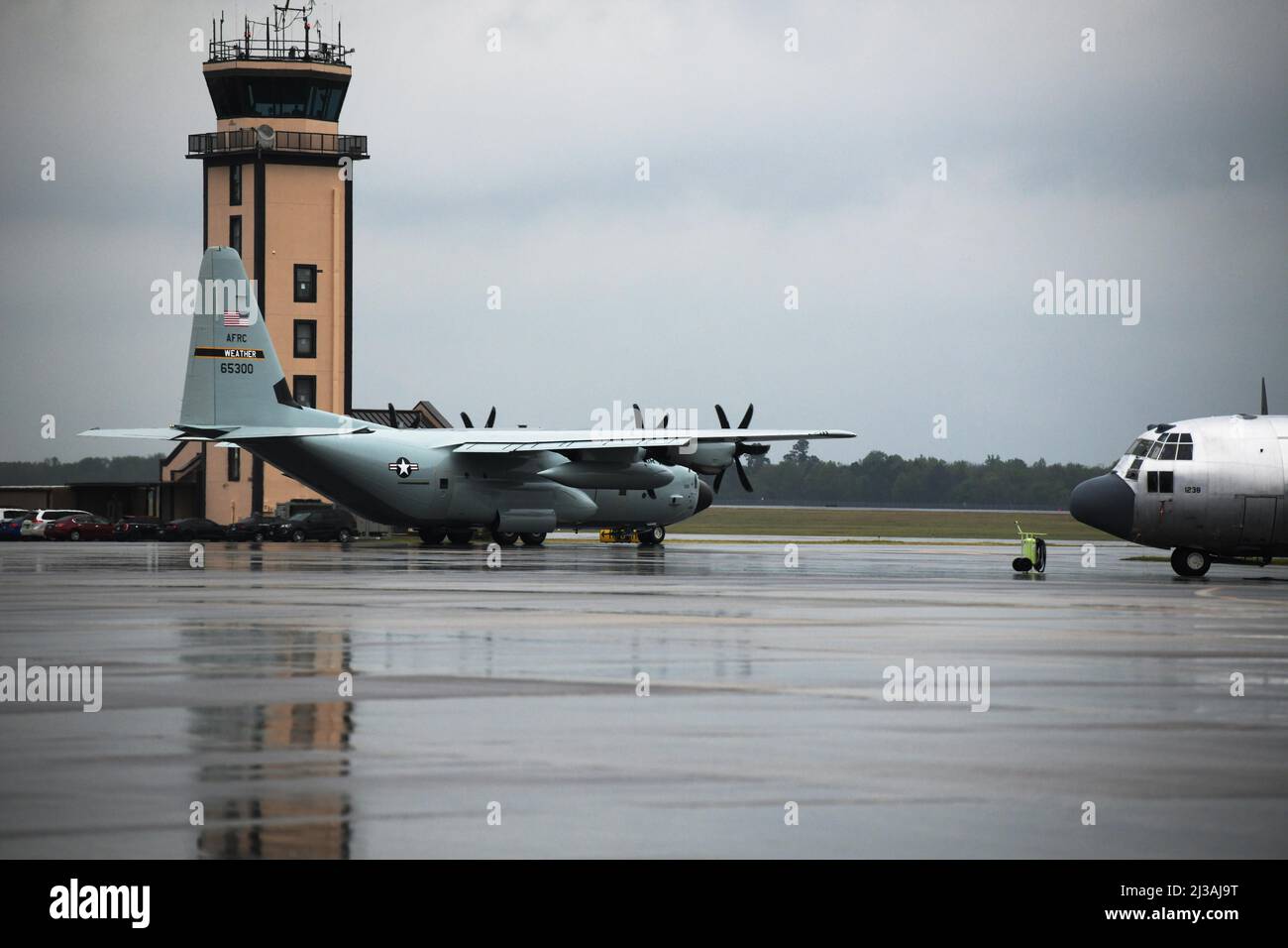 https://c8.alamy.com/comp/2J3AJ9T/robins-air-force-base-ga-the-wc-130j-aircraft-from-keesler-air-force-base-mississippi-passes-by-the-air-traffic-control-tower-at-robins-air-force-base-georgia-april-5-2022-the-weather-aircraft-received-depot-level-maintenance-at-the-warner-robins-air-logistics-complex-and-now-dons-a-glossy-gray-paint-scheme-which-is-a-throwback-to-the-original-look-of-the-weather-aircraft-prior-to-2008-us-air-force-photo-by-kisha-foster-johnson-2J3AJ9T.jpg