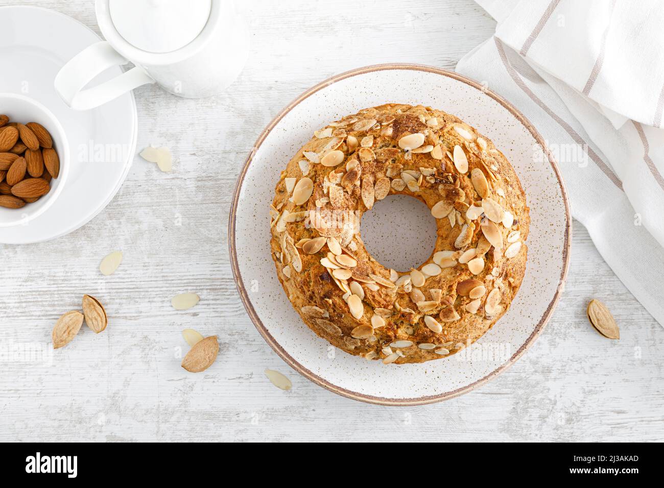 French almond cake with nuts. Top view, overhead Stock Photo