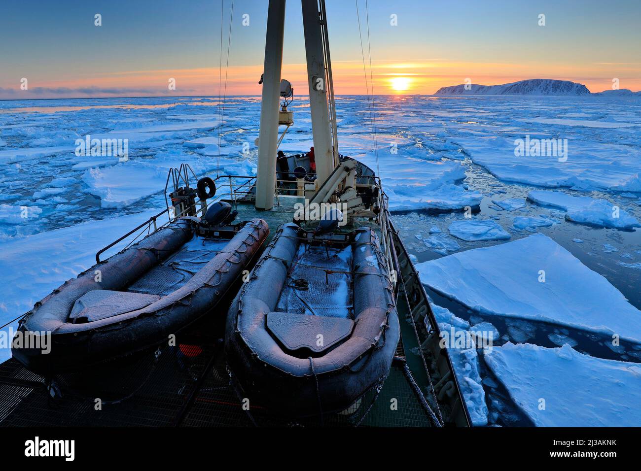 Boat in winter Arctic. White snowy mountain, blue glacier Svalbard ...