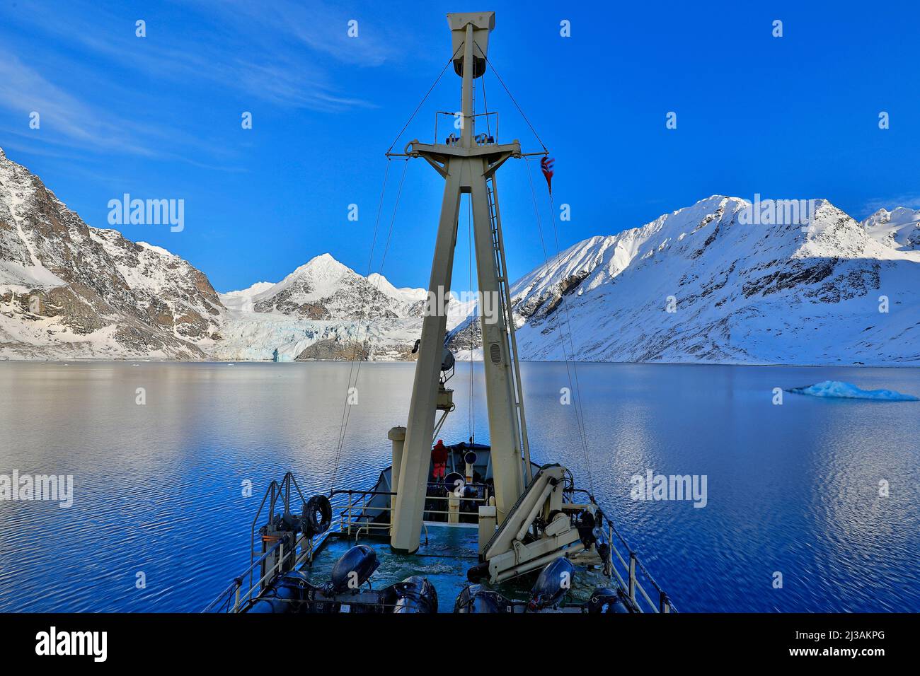 Boat in winter Arctic. White snowy mountain, blue glacier Svalbard ...