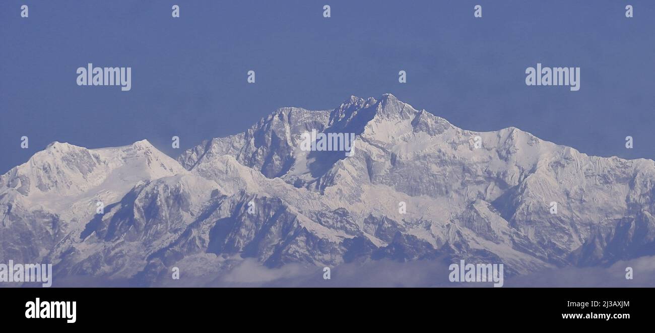 world 3rd hightest peak mount kangchenjunga and snowcapped himalaya from beautiful mountain village lepcha jagat near darjeeling in west bengal, india Stock Photo