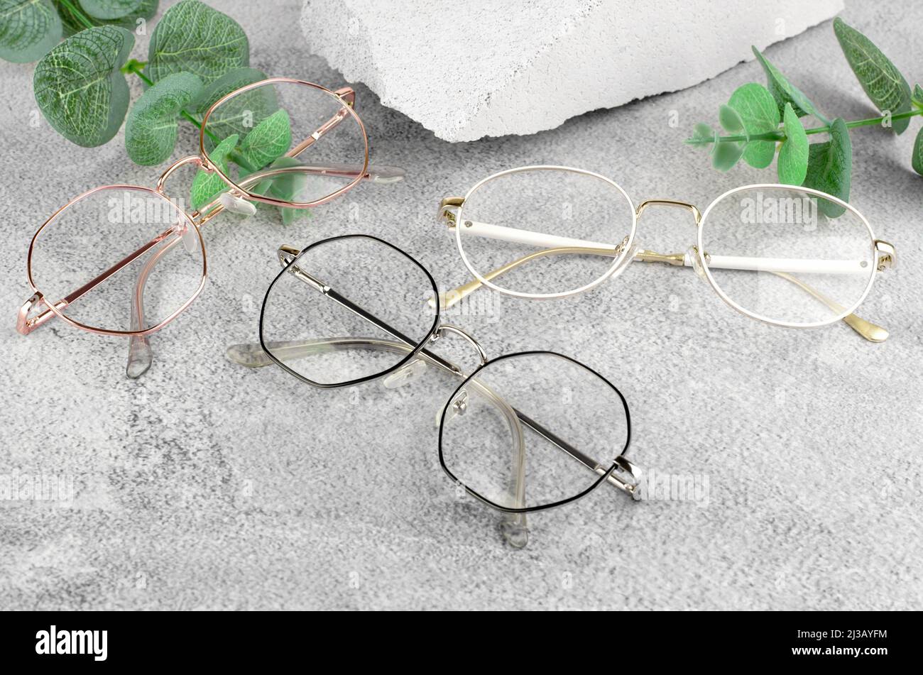 Glasses For Vision Of Different Types On A Concrete Background Stock glasses-for-vision-of-different-types-on-a-concrete-background-stock
