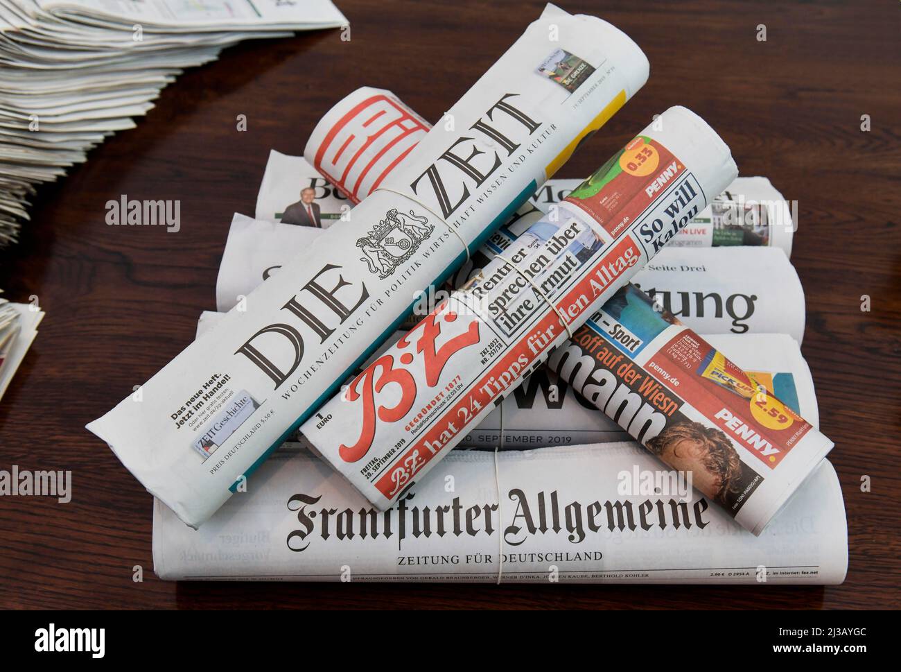 Stack of various newspapers Stock Photo