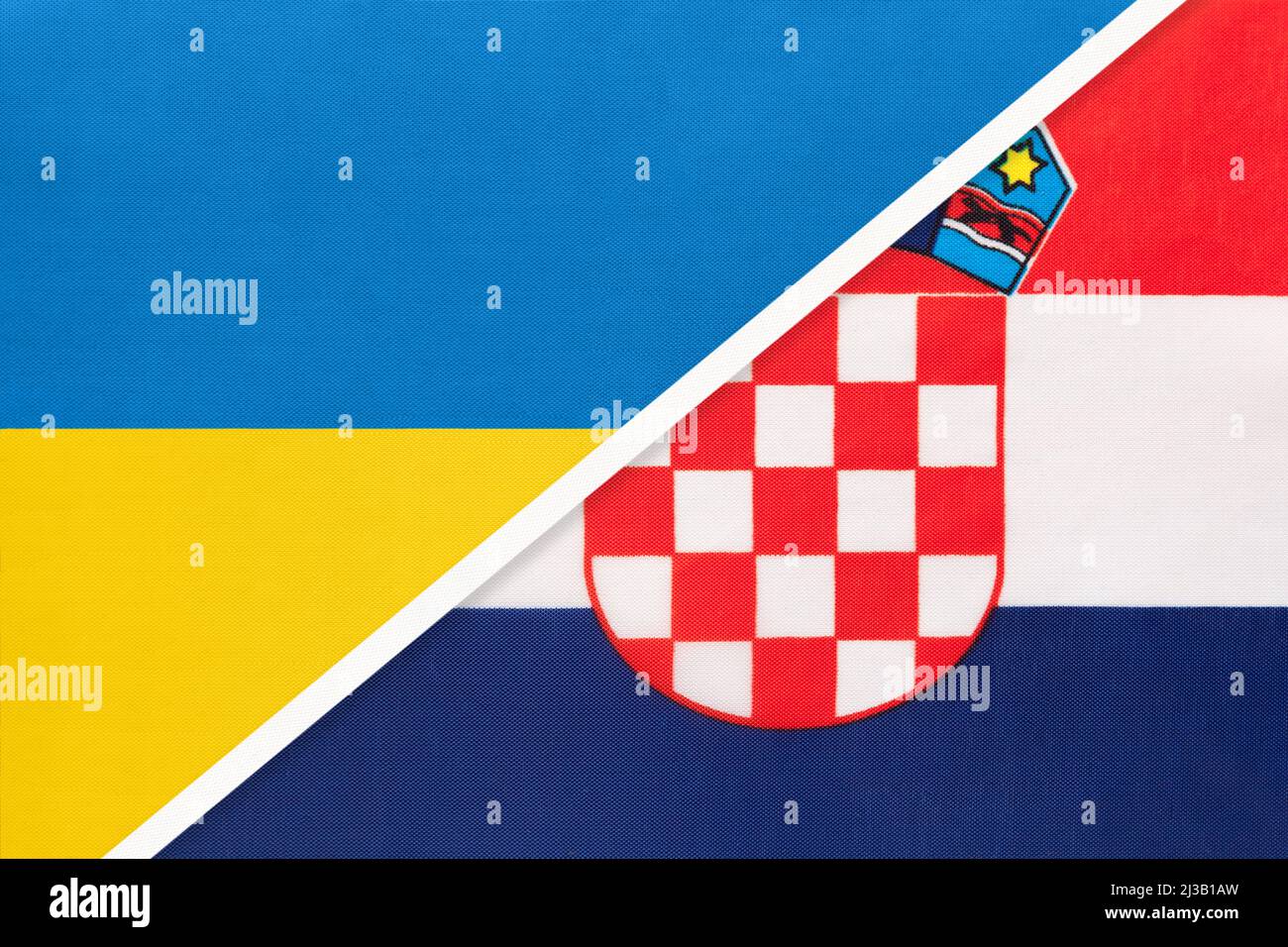 Ukraine and Croatia, symbol of country. Ukrainian vs Croatian national flags. Relationship and partnership between two countries. Stock Photo
