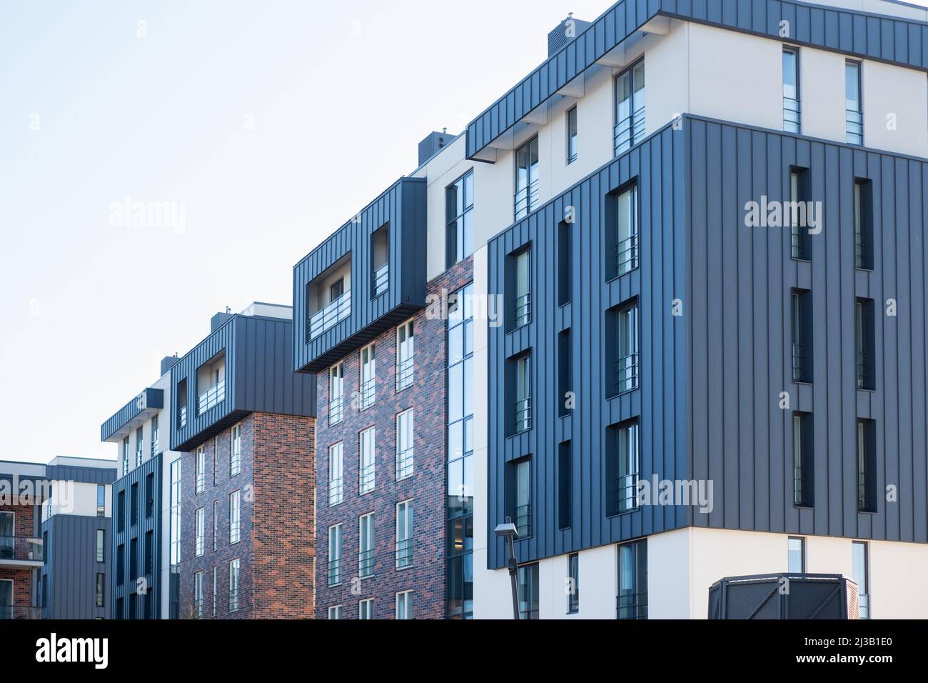 Modern residential apartment building. Real estate development. New building complex in Europe. Stock Photo