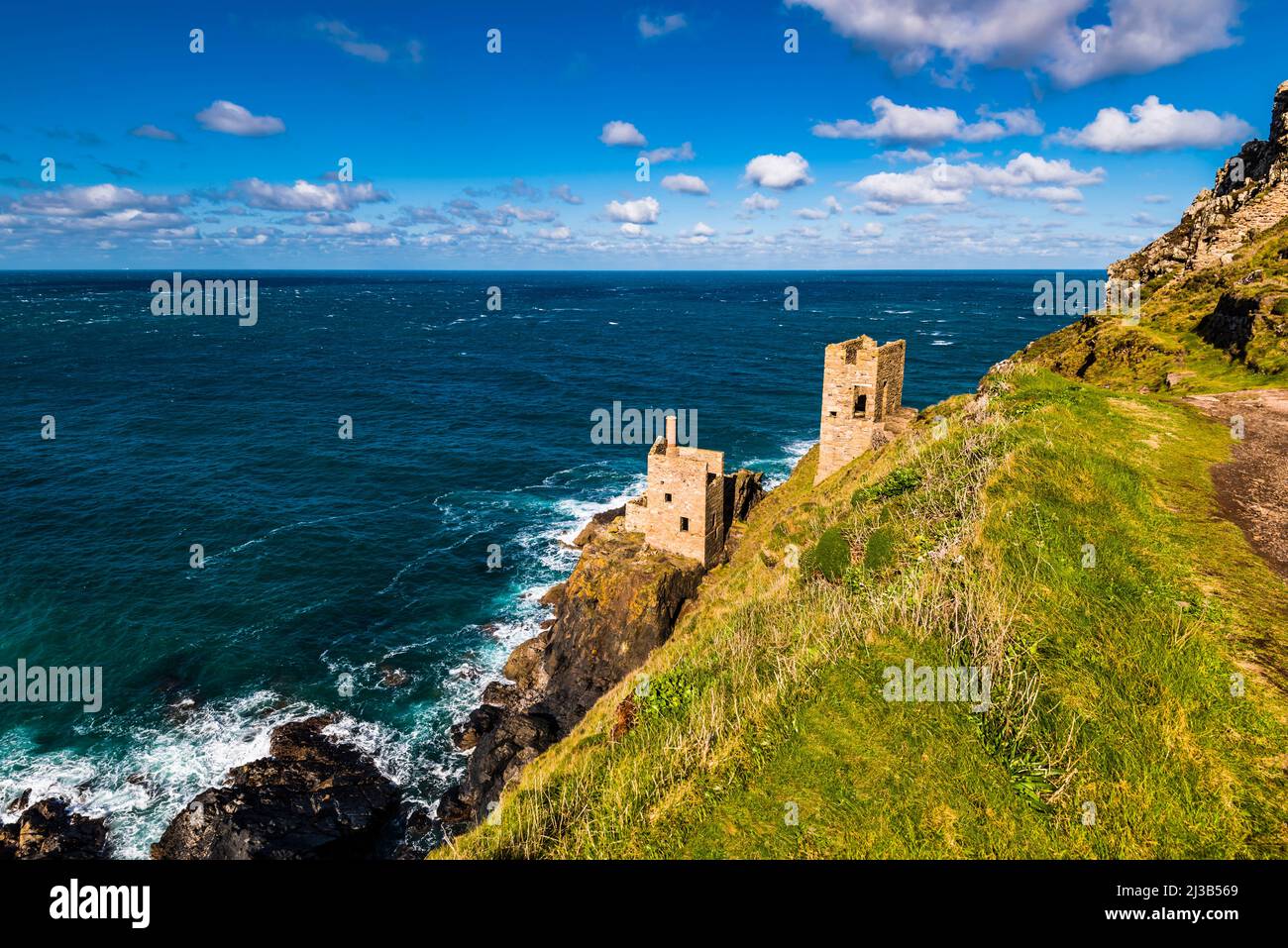 View down the cliffs to The Crowns engine houses at Botallack Mine, Cape Cornwall, near Penzance, Cornwall, UK Stock Photo