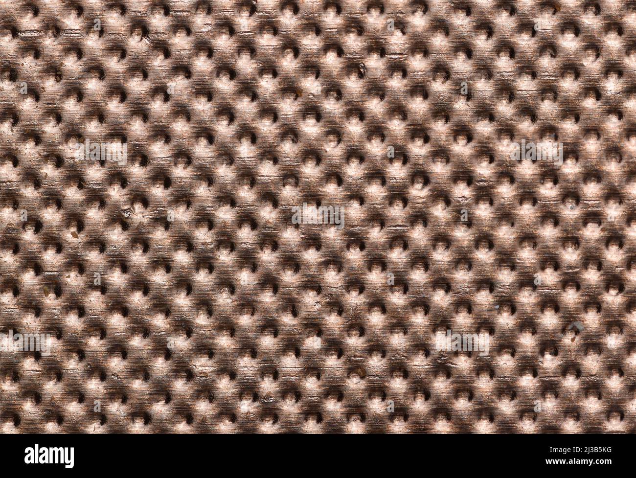 Textured brushed metallic background in copper color. Stock Photo
