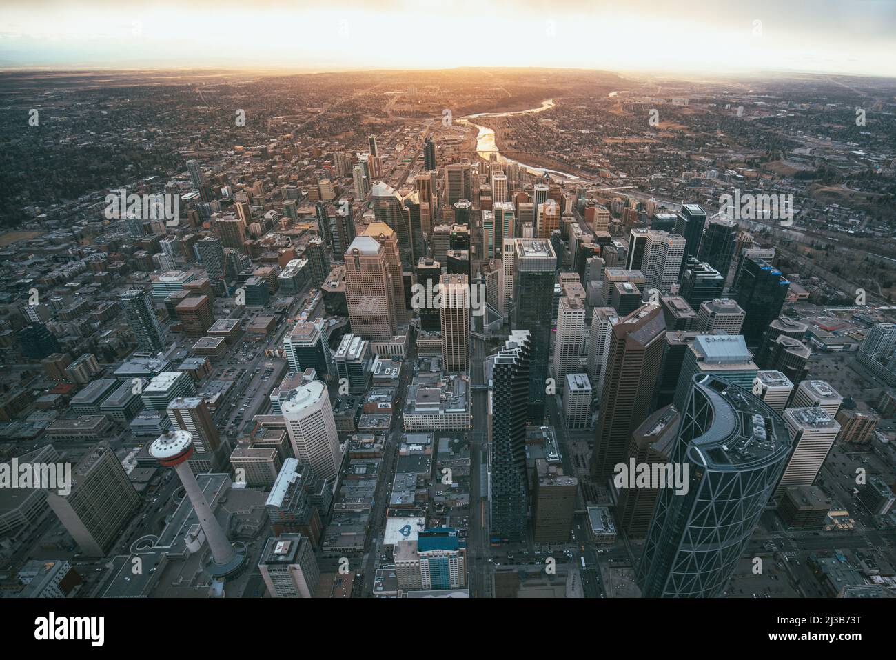 Aerial view of the city of Calgary with the sunset on the horizon Stock
