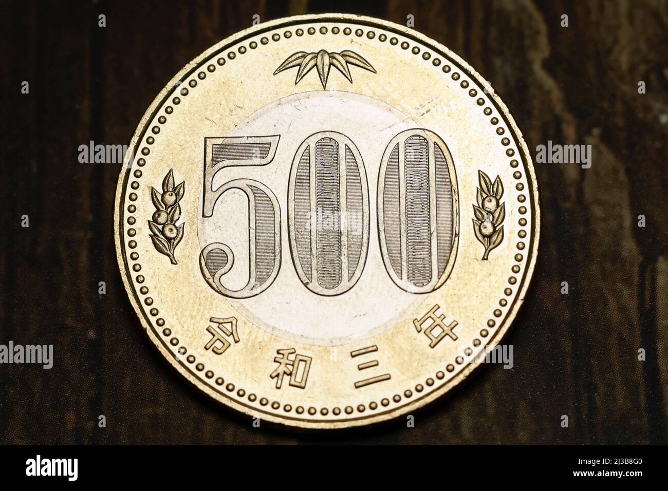 A sample of the new version of a Japanese 500 yen coin is photographed on April 7, 2022, in Tokyo, Japan. The latest version coin in two-tone was issued in the first half of fiscal 2021 to commemorate the 150th anniversary of the modern currency system. Credit: Rodrigo Reyes Marin/AFLO/Alamy Live News Stock Photo