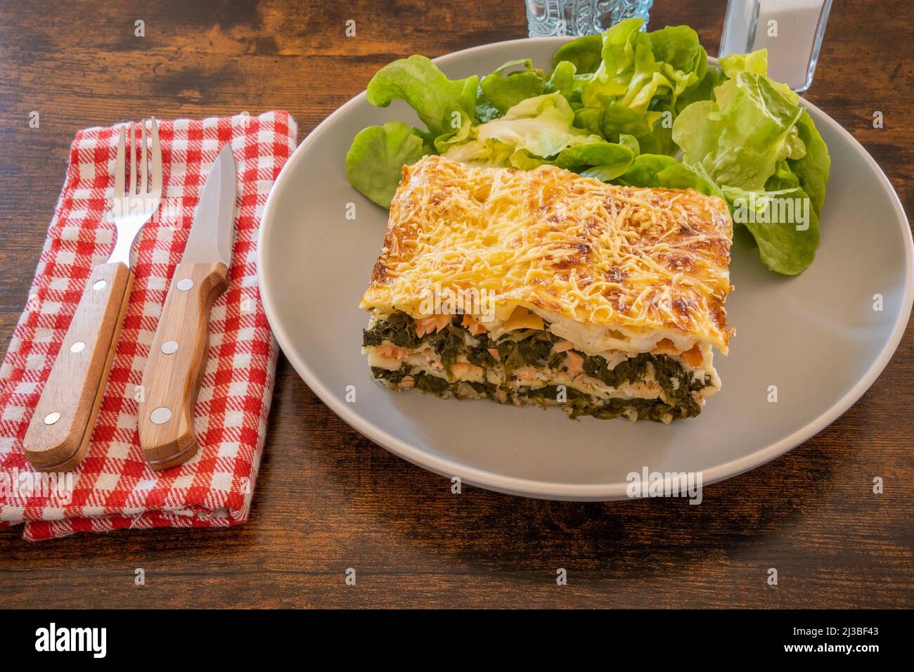 baked salmon lasagna with cheese and spinach Stock Photo Alamy