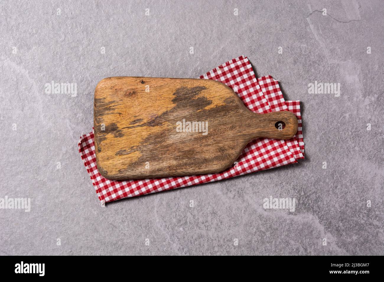 Cutting board on gray background Stock Photo