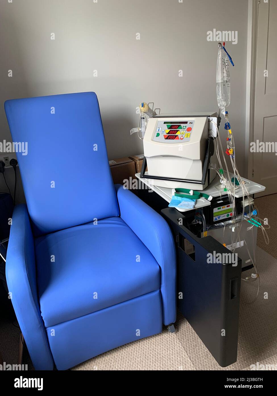 home dialysis setting with machine and blue chair Stock Photo Alamy
