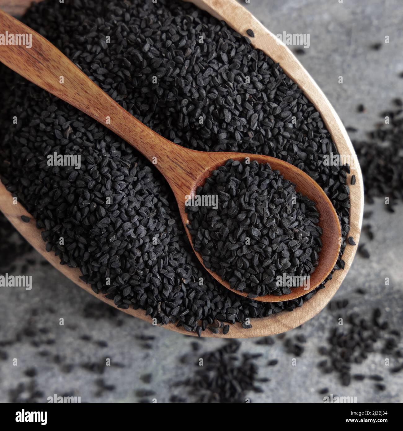 Indian Spice Black Cumin Nigella Sativa Or Kalonji Seeds In Bowl With Spoon On Grey Table Top View Traditional Medicine Healthy And Vegetarian Foo Stock Photo Alamy