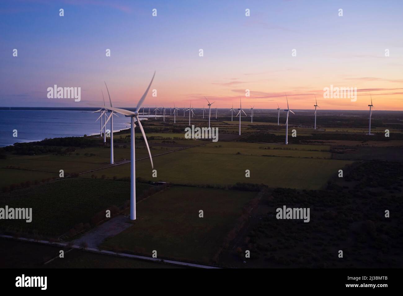 View of wind turbines at sunset Stock Photo