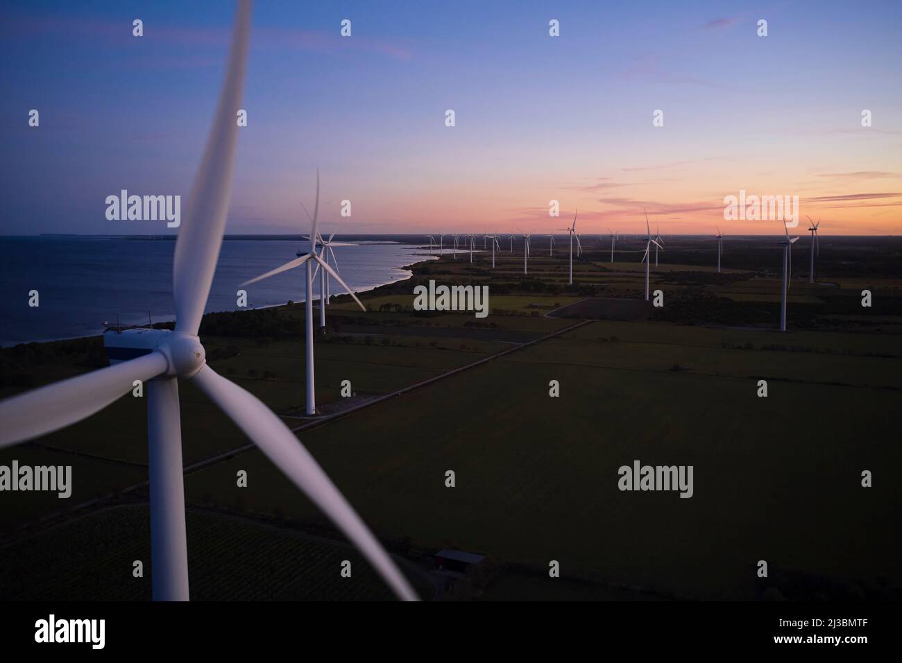 View of wind turbines at sunset Stock Photo