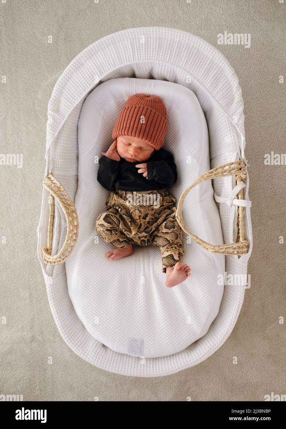 newborn-baby-boy-sleeping-in-cot-stock-photo-alamy