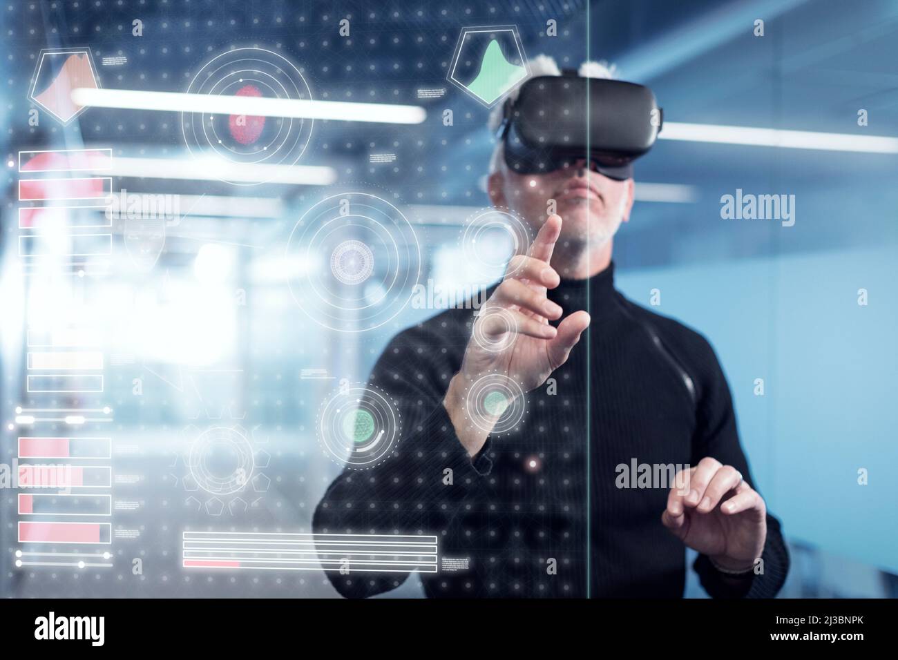 Senior man in virtual reality headset using advanced technology Stock ...