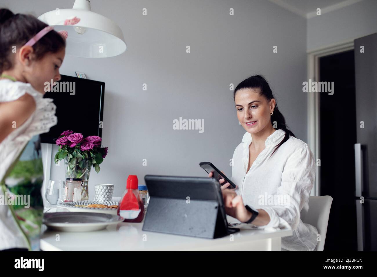 Family phone dining table hi-res stock photography and images - Alamy