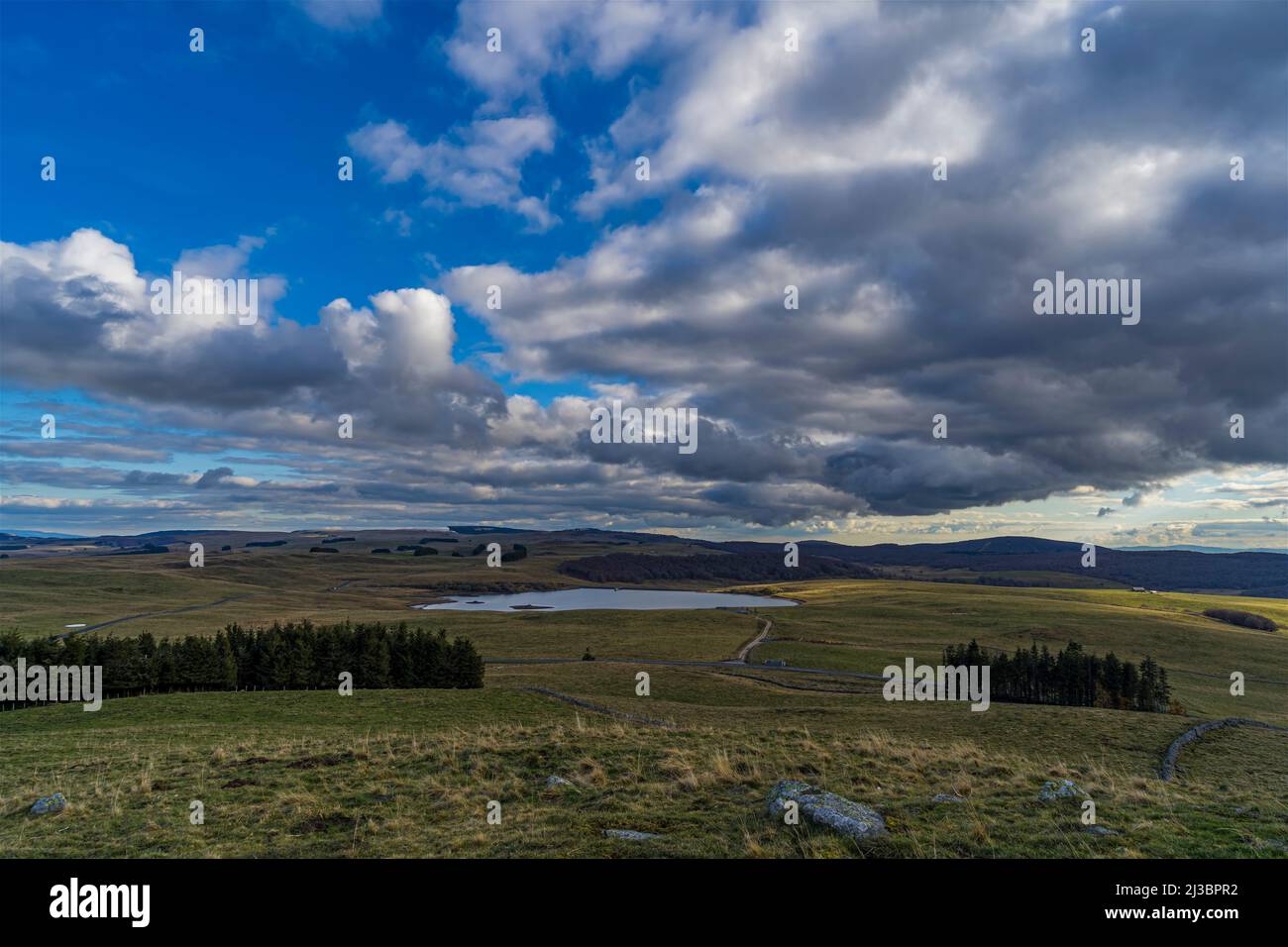 A lake in the Desert Hills French Landscape Nature Cloudy Sky Stock Photo