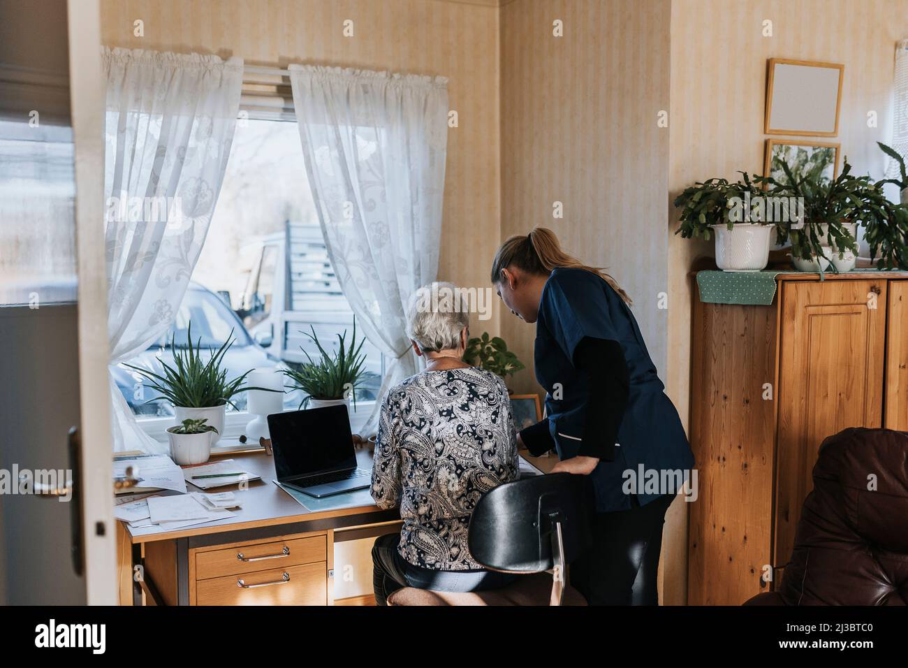 Old people care home rear view hi-res stock photography and images - Alamy