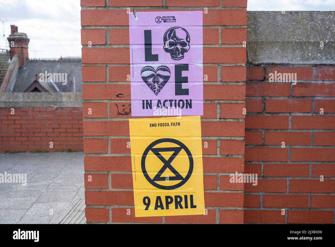 Southend on Sea, Essex, UK. 7th Apr, 2022. Posters have appeared on walls to advertise the upcoming action by Extinction Rebellion to protest against climate change. Civil resistance is planned in London from the 9th to 17th of April, with a large demonstration to be held in Hyde Park on the first day. The group are planning to cause disruption in the city to highlight the issues such as fossil fuels Stock Photo