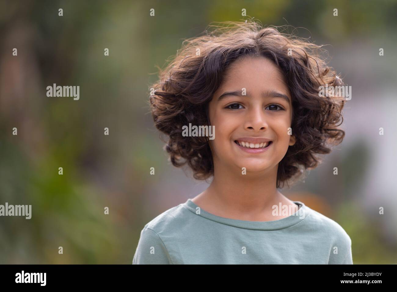 Portrait of a happy little boy looking at the camera with smile Stock ...