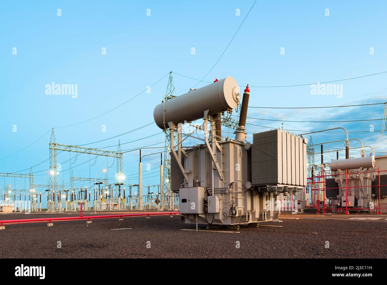 Power Transformer in High Voltage Electrical Outdoor Substation Stock Photo