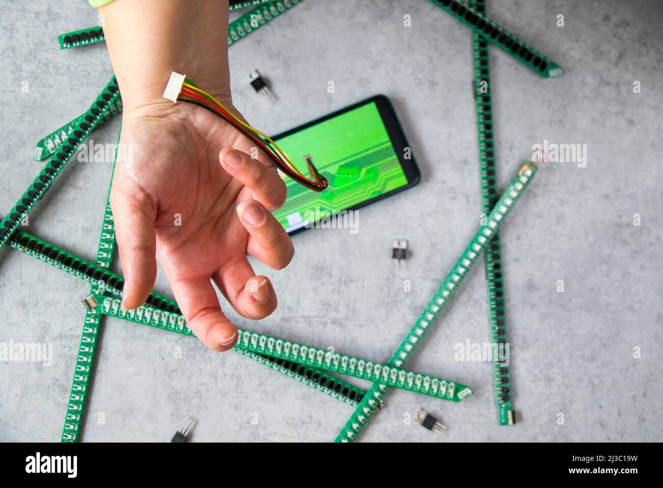 Cable and mobile motherboard parts digital communication cellphone addicted and obsession Stock Photo Alamy