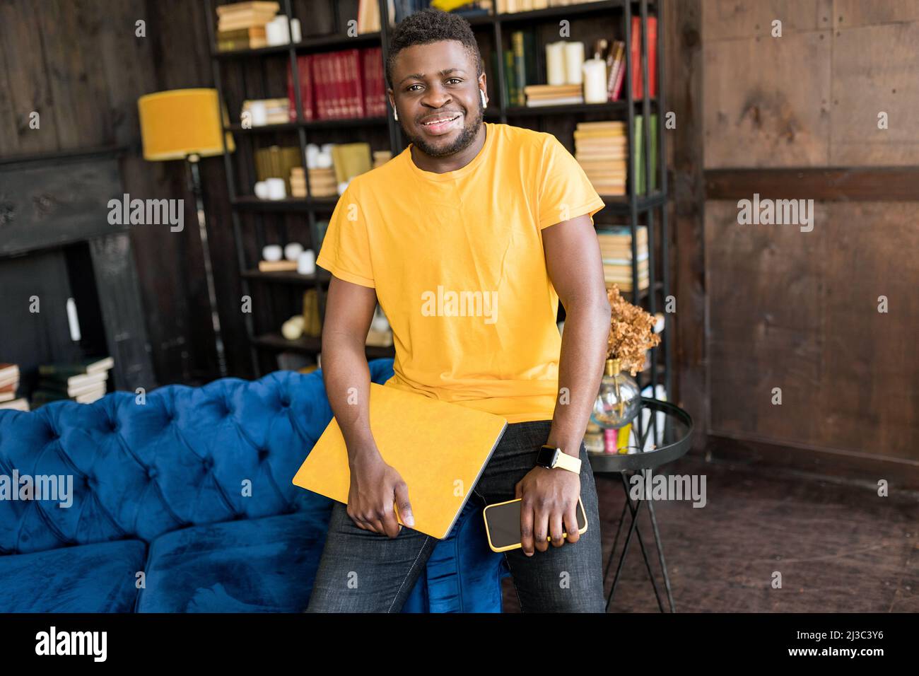 Smiling young african american student or business man professional