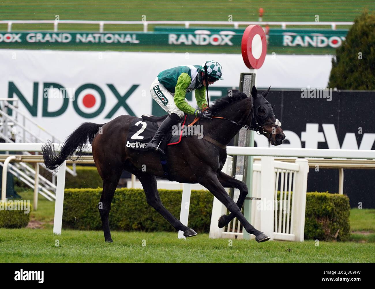 Clan Des Obeaux ridden by Harry Cobden on their way to winning the Betway Bowl Chase at Aintree Racecourse, Liverpool. Picture date: Thursday April 7, 2022. Stock Photo