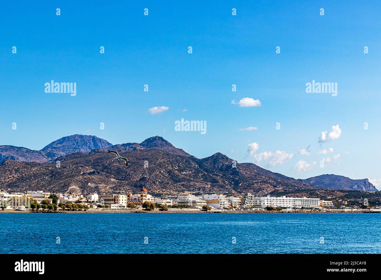 The harbour of Ierapetra with views towards the mountains. Ierapetra is the largest town on the south coast of Crete Island, Greece, Europe. Stock Photo